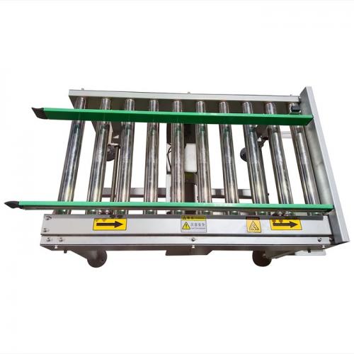Transportador de posicionamiento de cajas